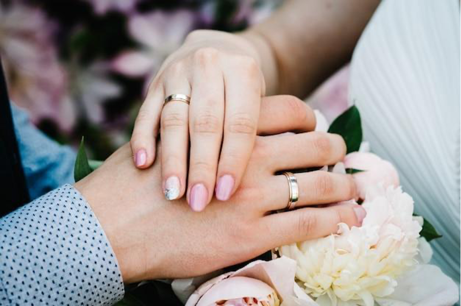 Brides with white and rose gold wedding bands