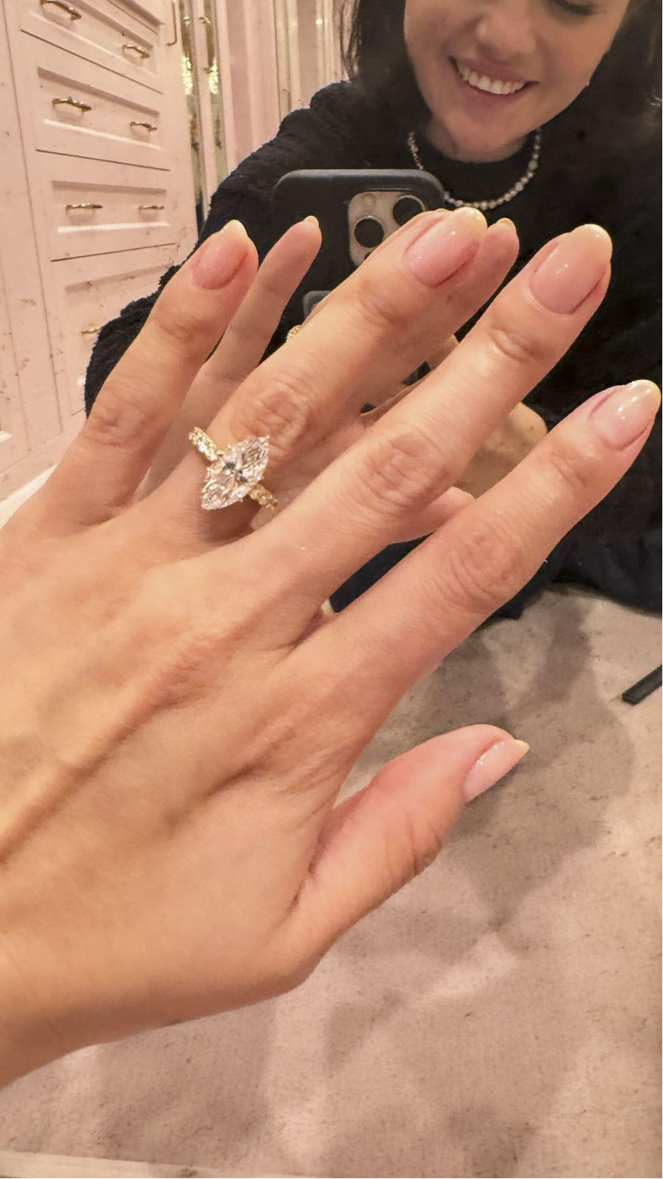 Selena Gomez with a 6-carat marquise-cut diamond engagement ring