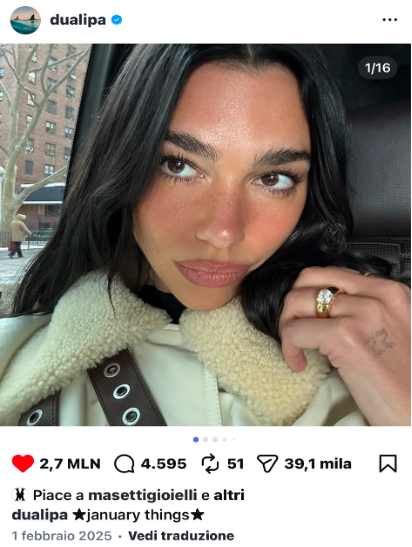 Dua Lipa's engagement ring - round brilliant diamond on 18k yellow gold band